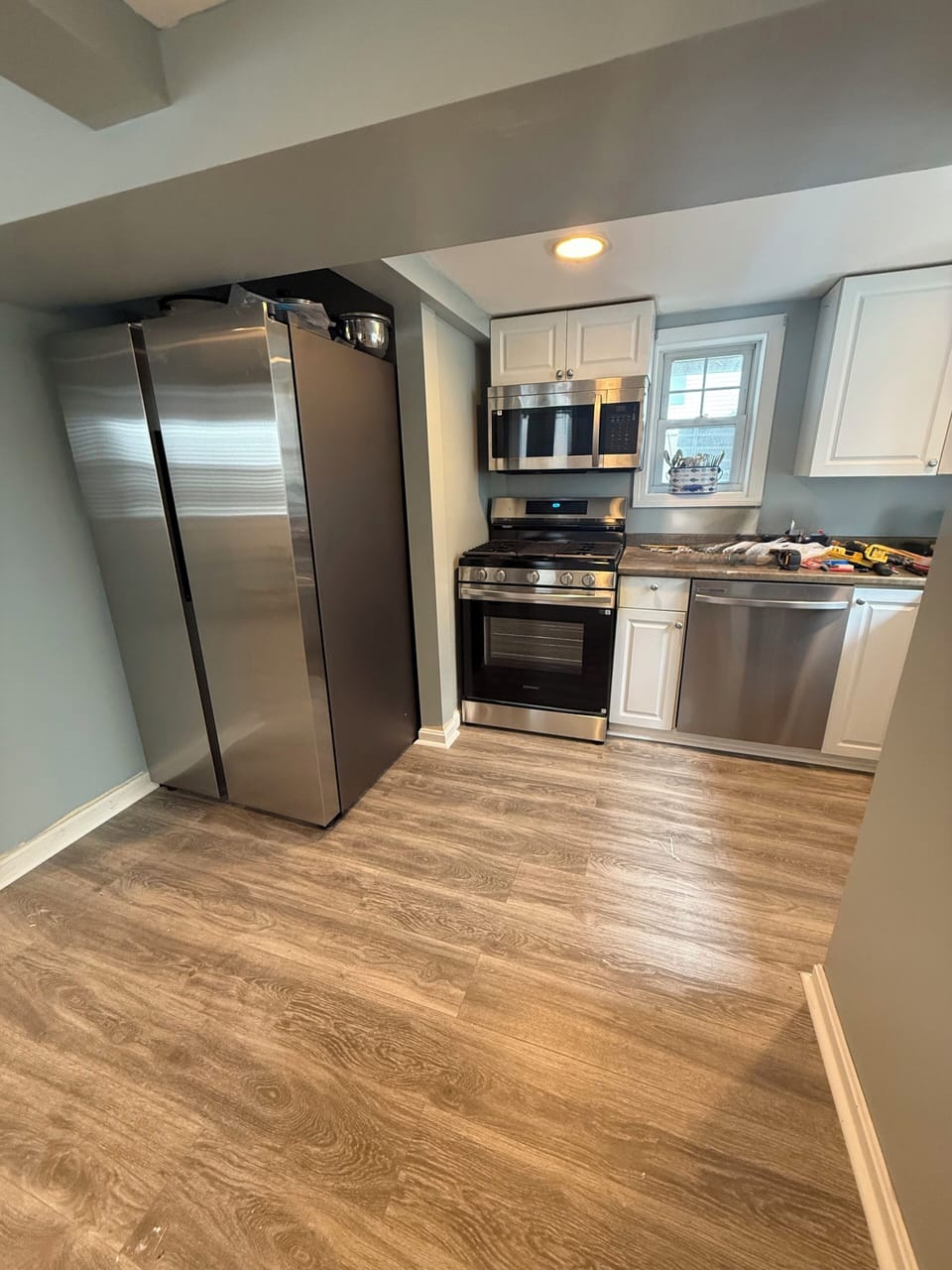 New stainless refrigerator, stove, microwave and dishwasher delivered and installed….