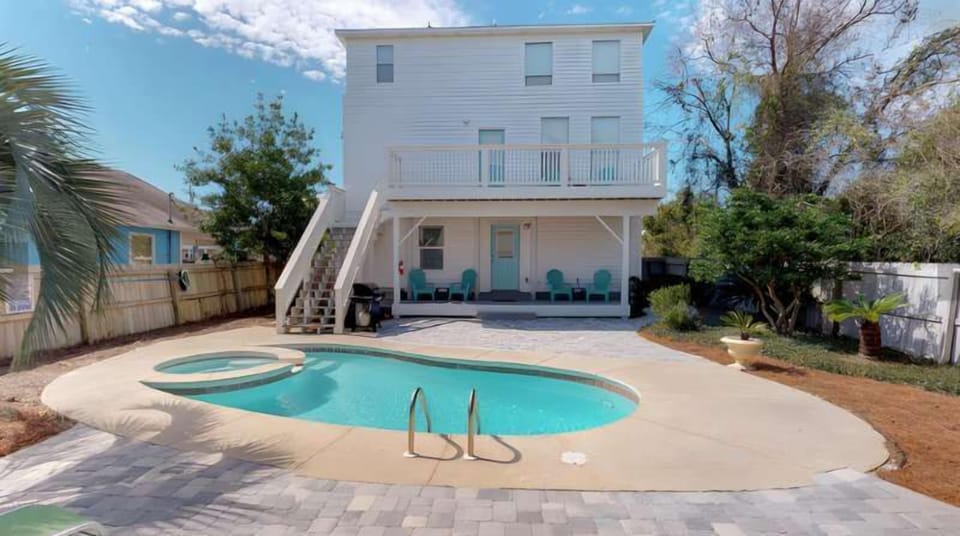 Soak in your very own private pool with easy access to the beach! 