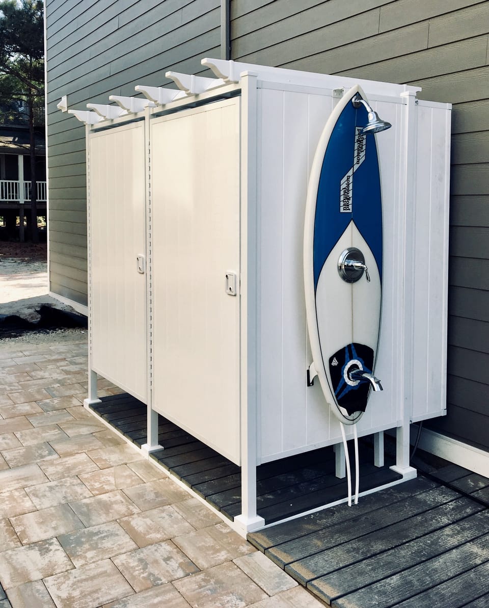 3 Convenient Outdoor Showers (2 enclosed; 1 outside) Louvered Roofs for Privacy