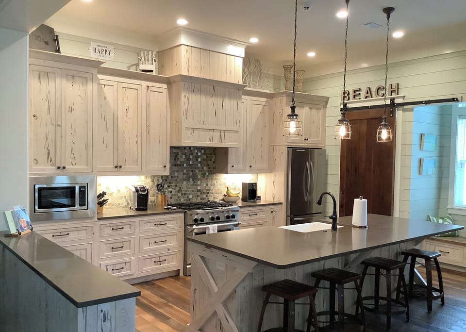 Fully stocked kitchen with stainless steel appliances