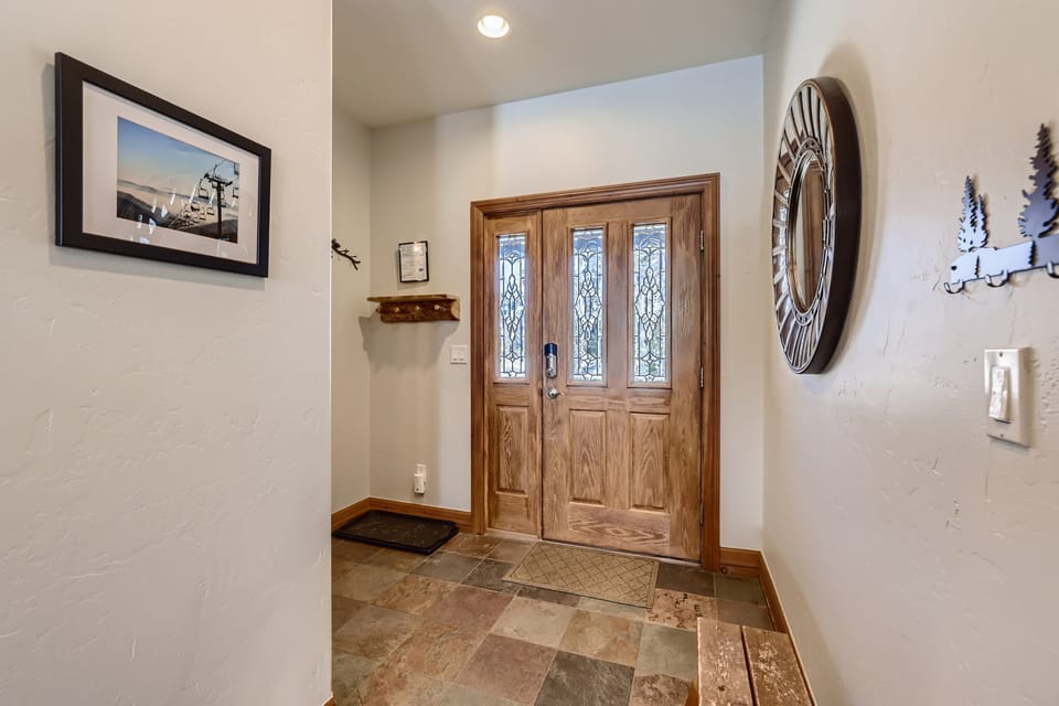Inside view of the front door.  Powder bathroom is just to the left.
