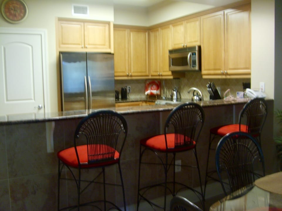 Convenient Breakfast Bar with seating for three. 