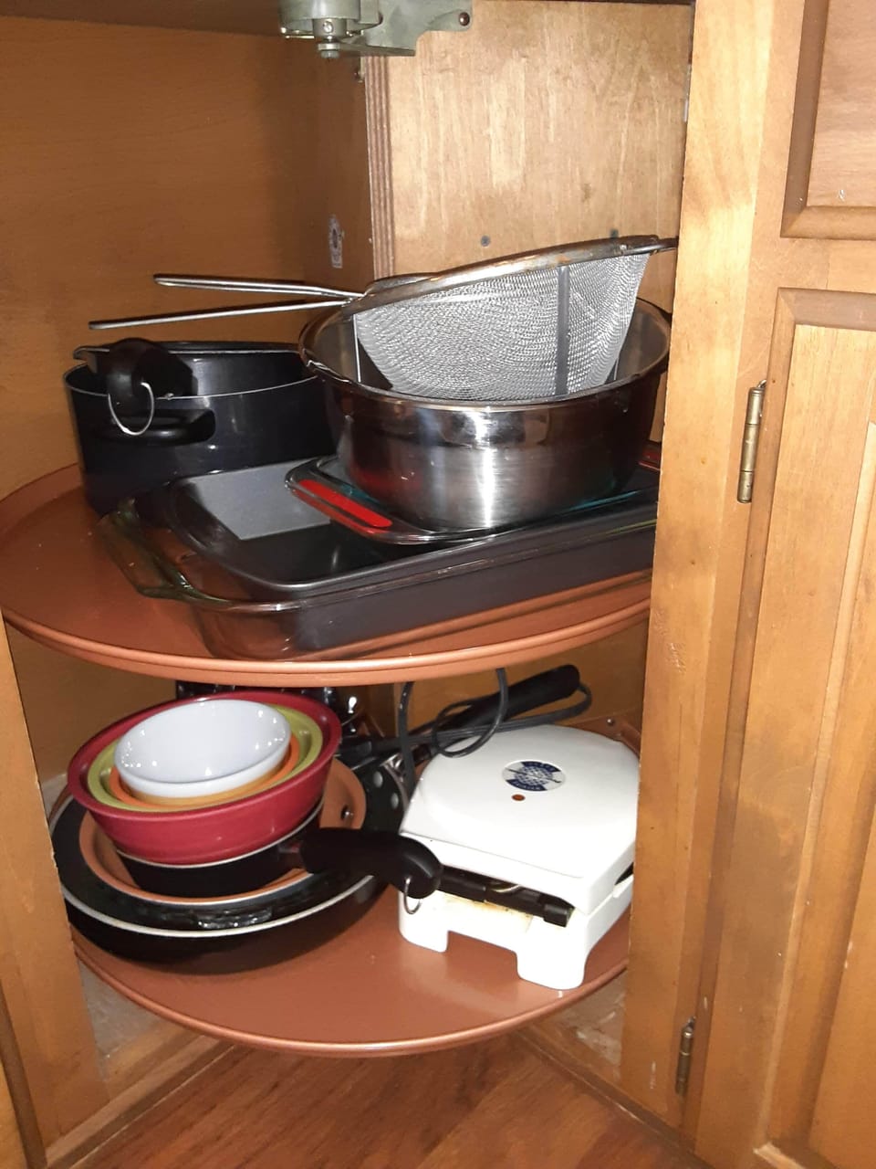 kitchen is well stocked with cooking and grill supplies