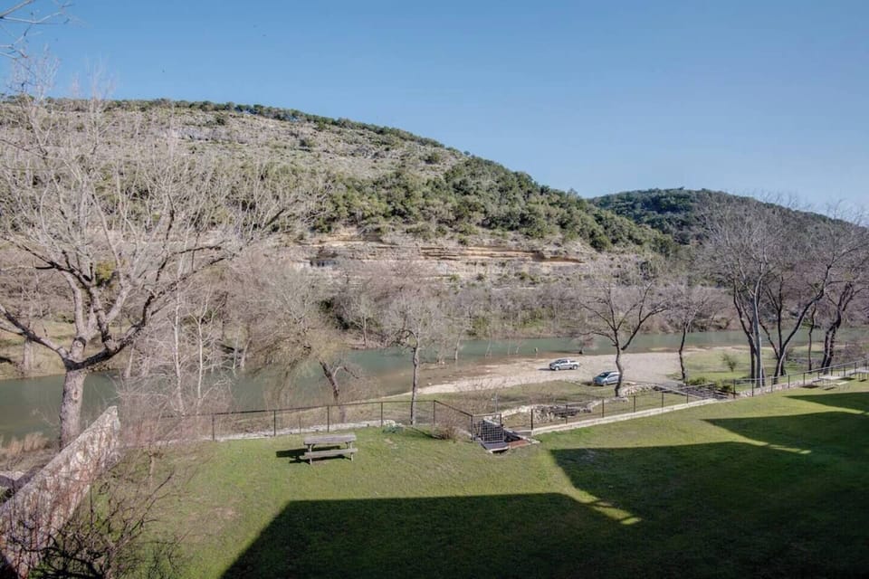 View of the yard towards the river from the deck.