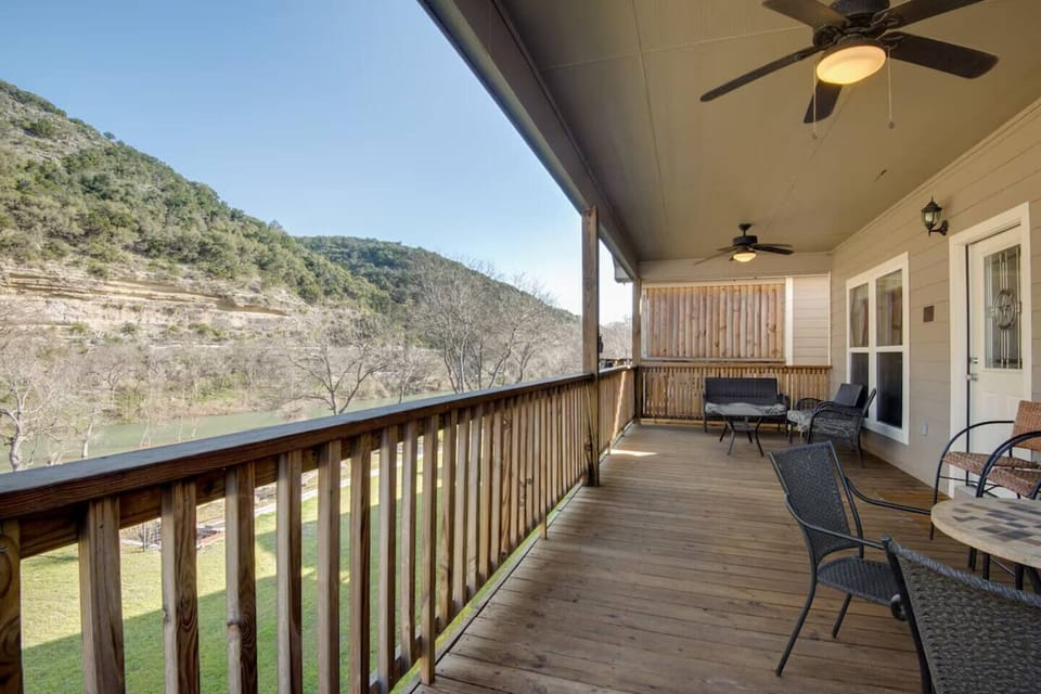 Upstairs deck with views of the 400 ft cliffs across the river.