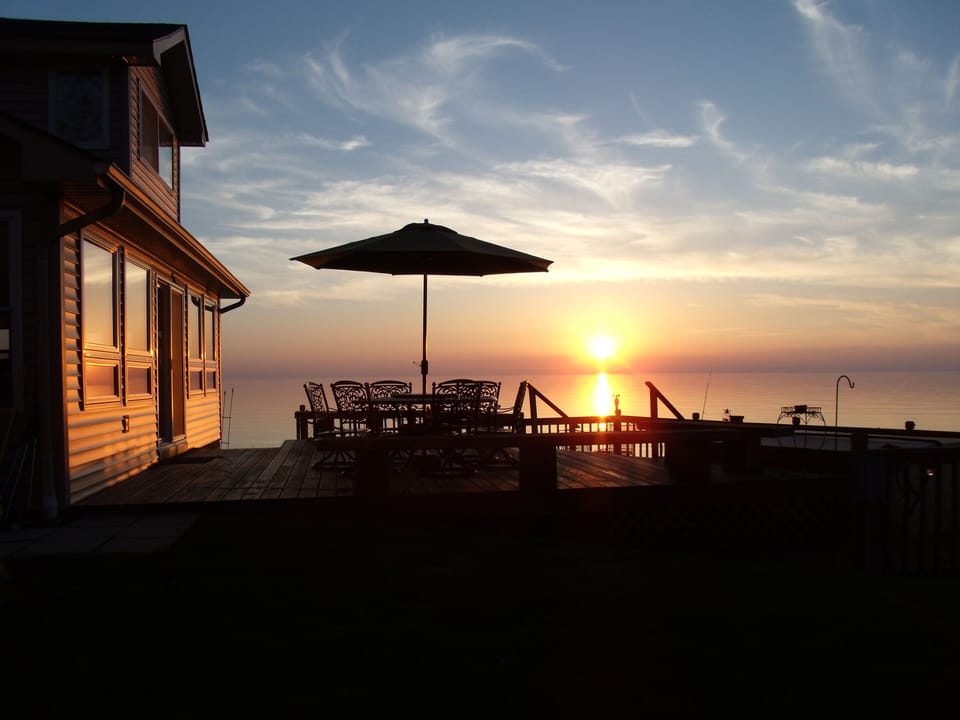 A beautiful Lake Erie sunset from the tiered deck off the main house