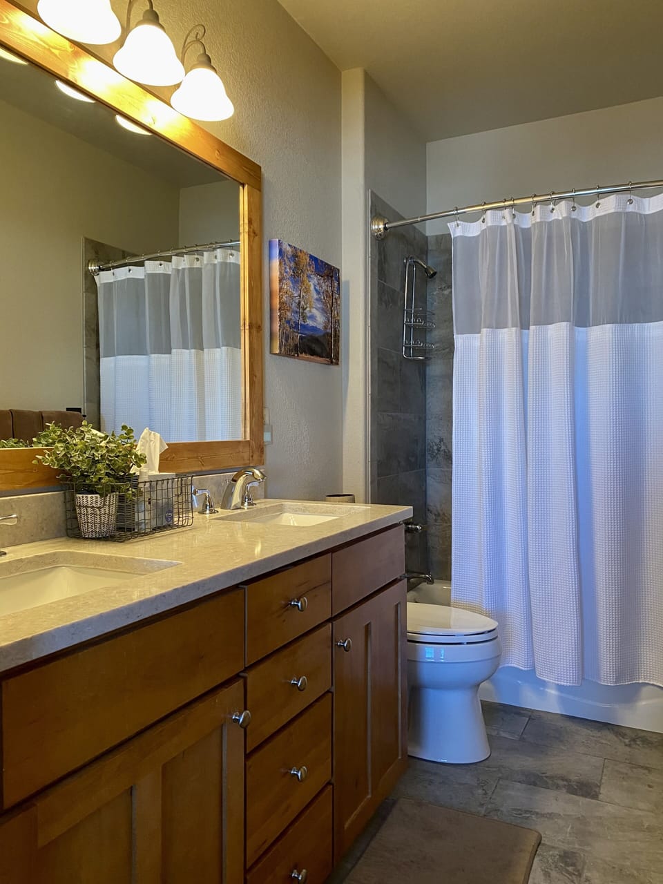 Newly-renovated double sink master bathroom. 
