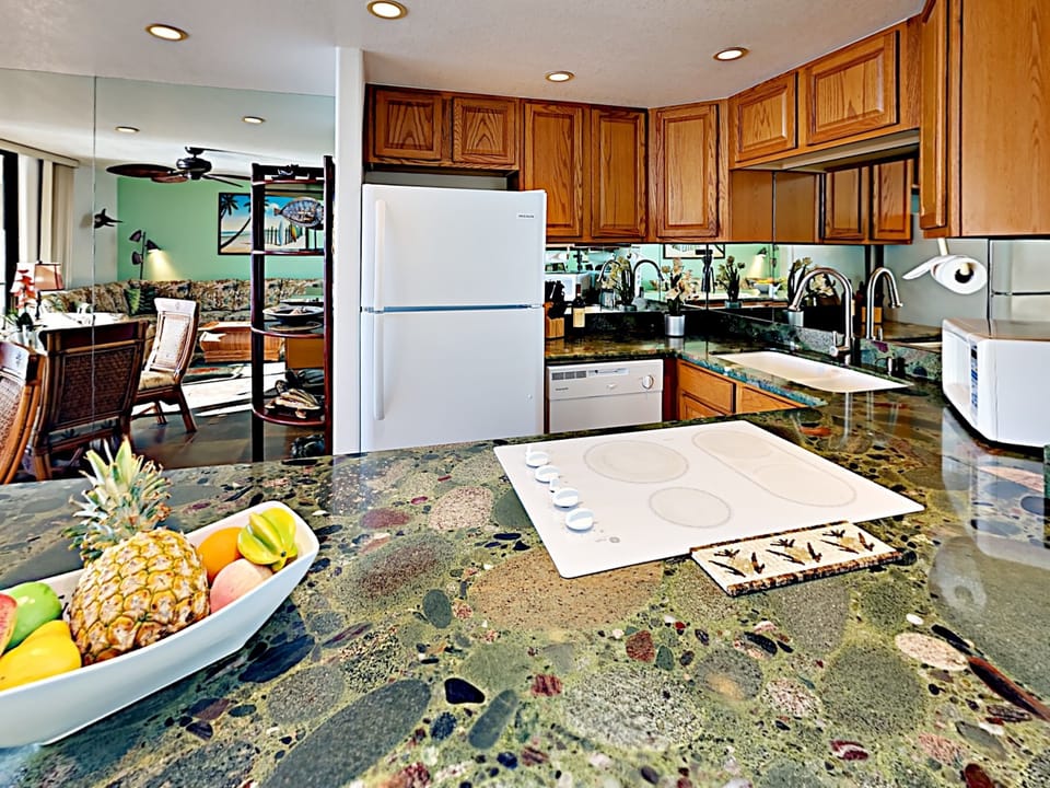 Kitchen - Open kitchen layout for the whole family to stay together while preparing meals.