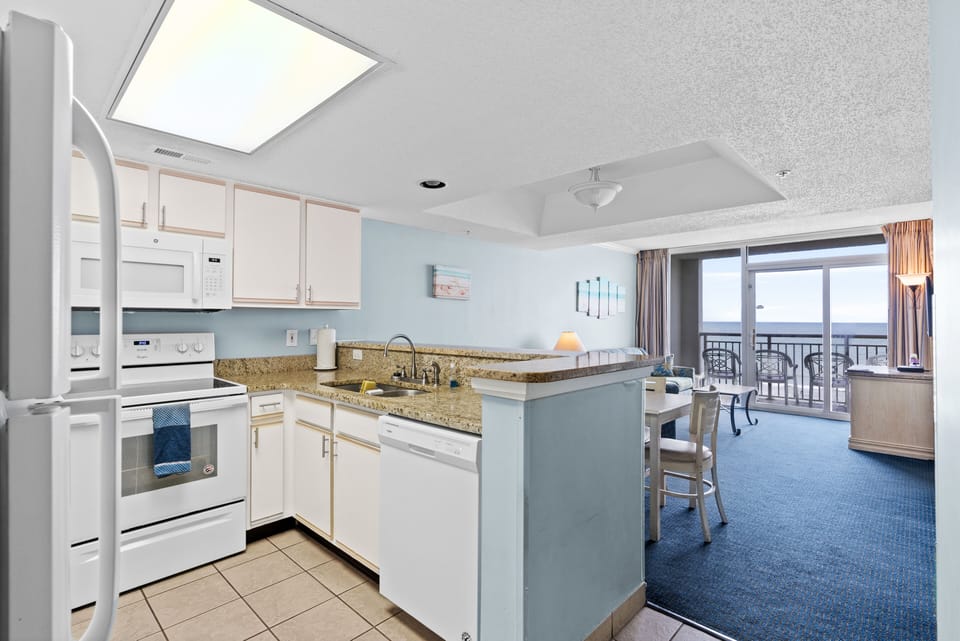 Updated kitchen will granite, full size appliances, Keurig, and dishwasher