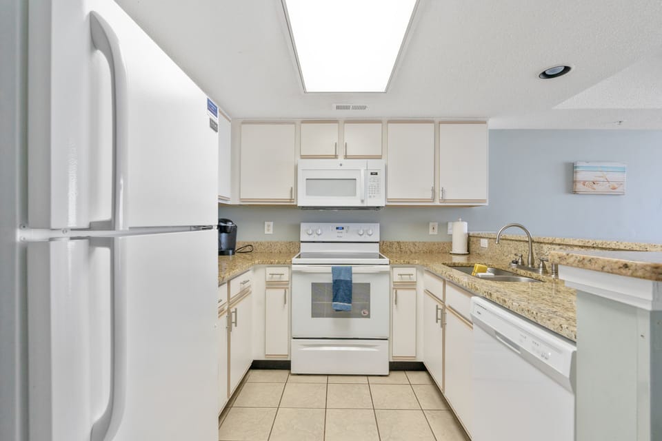 Updated kitchen will granite, full size appliances, Keurig, and dishwasher