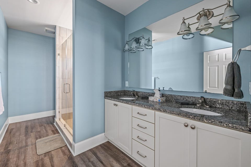 #5 Bathroom. Double vanity sinks and beautiful tiled shower. 