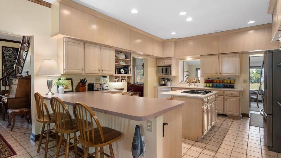 Stocked pantry, coffee station.  Fridge/freezer + mud room fridge & freezer