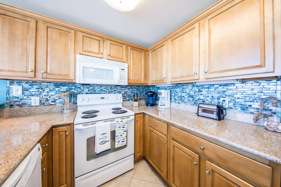 If you like Pina Coladas.....this kitchen will do the trick!  New backsplash