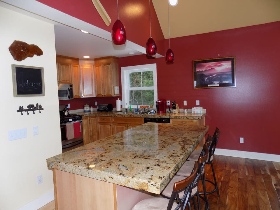 Open kitchen with granite counters