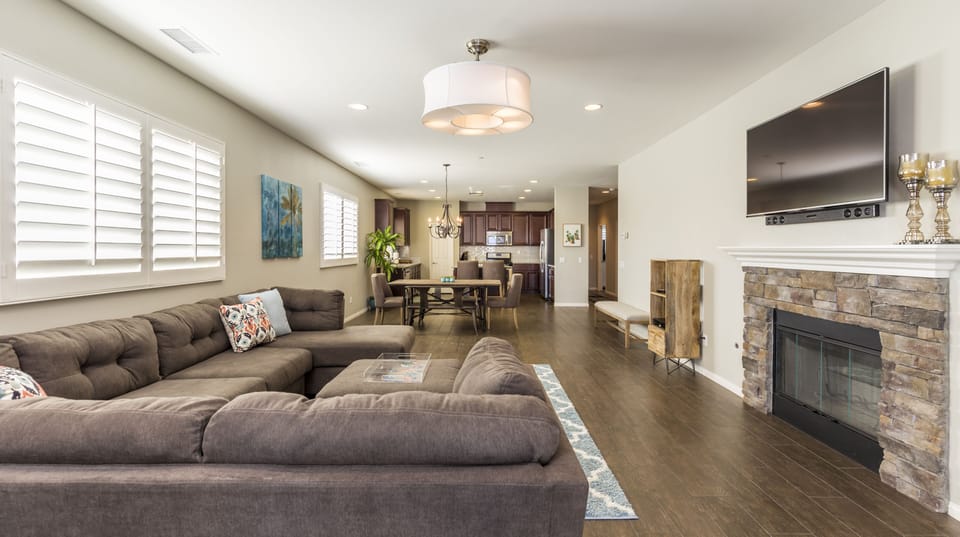 Open living room: 55” smart TV (premium cable, Netflix & Disney+)