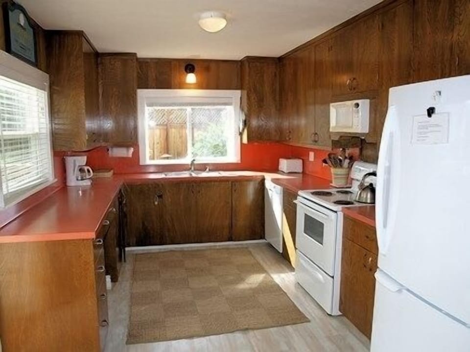 Kitchen, opens to outdoor covered dining area