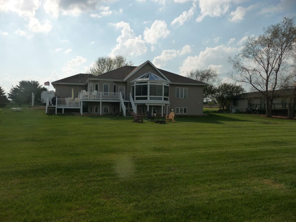 Huge backyard with nice Fire pit area - all lakeside! We have yard games on site