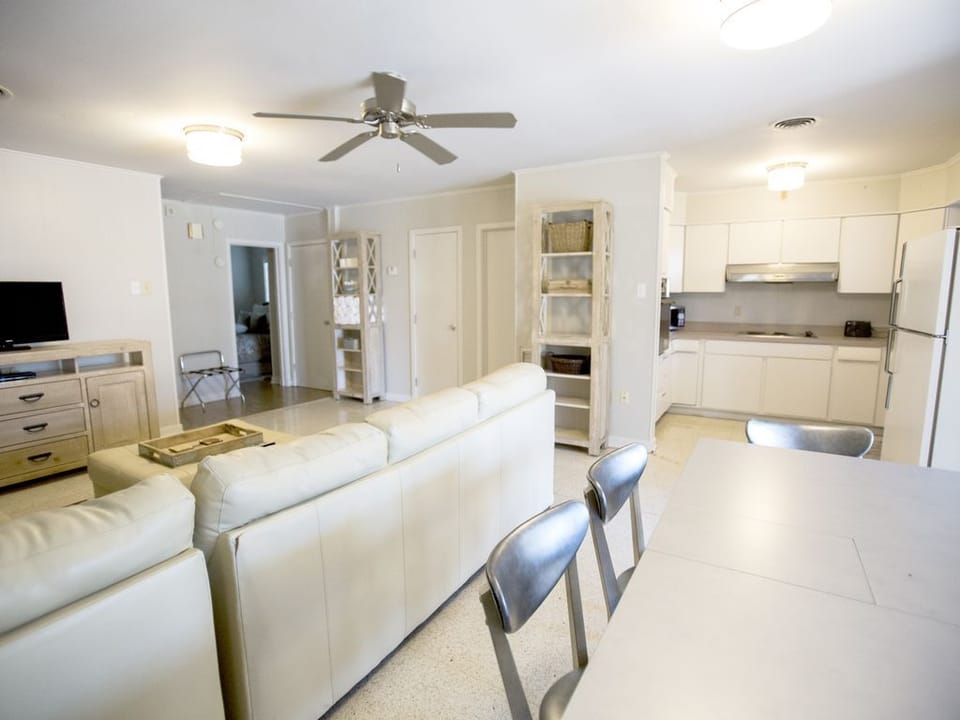 View into kitchen from dining room table