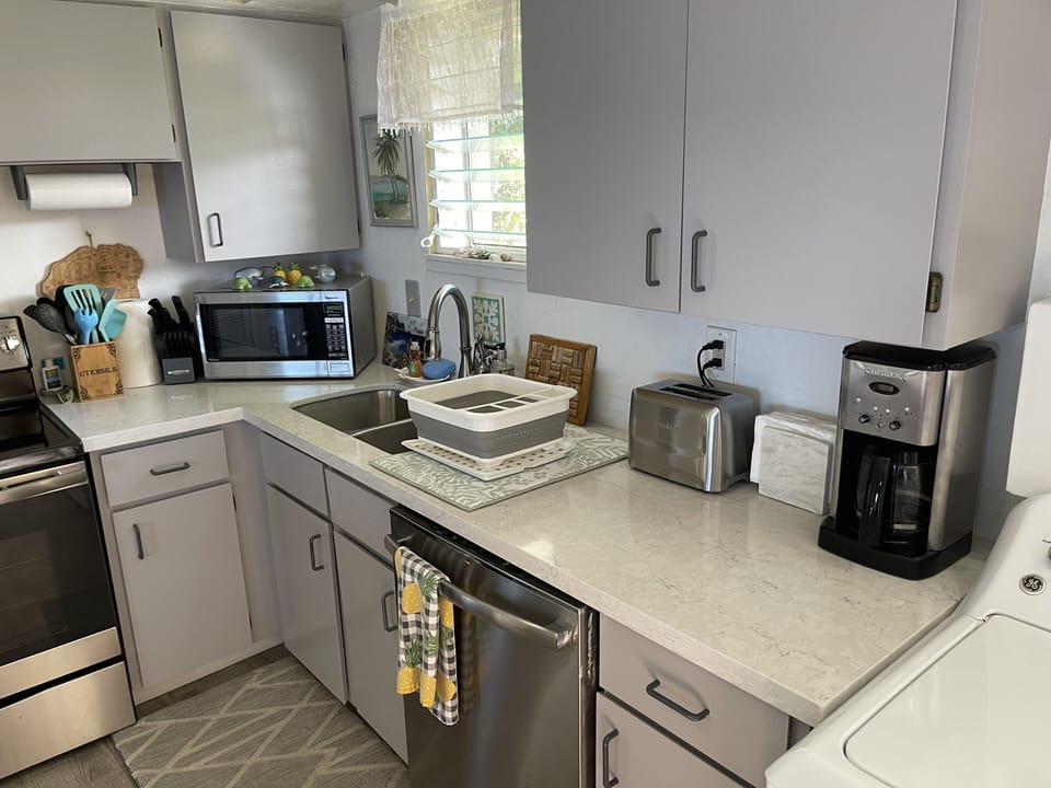 Updated kitchen with Quartz and fully stocked