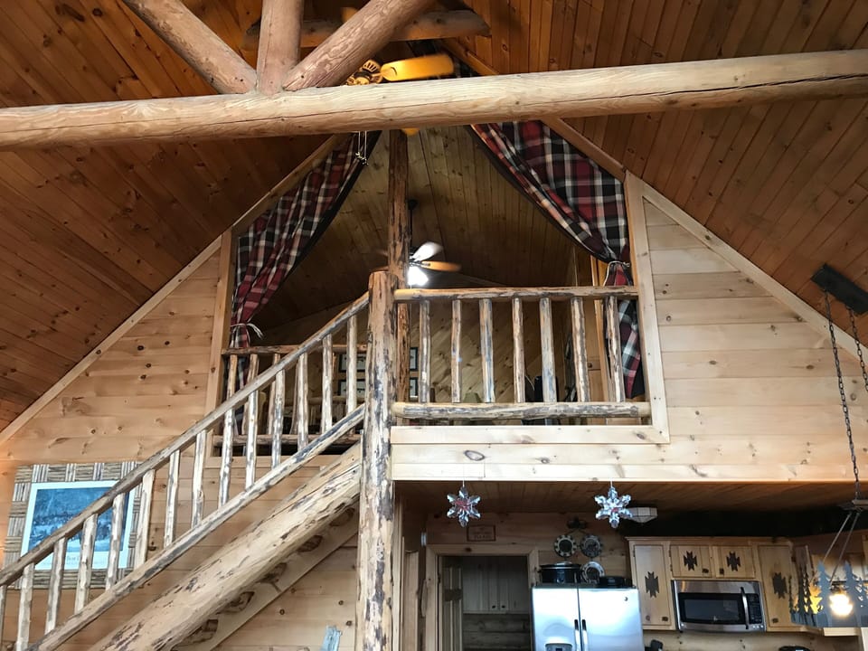 Privacy curtain above the loft bedroom.