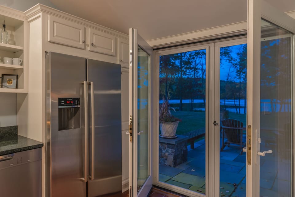 Kitchen doors out to the yard and lake