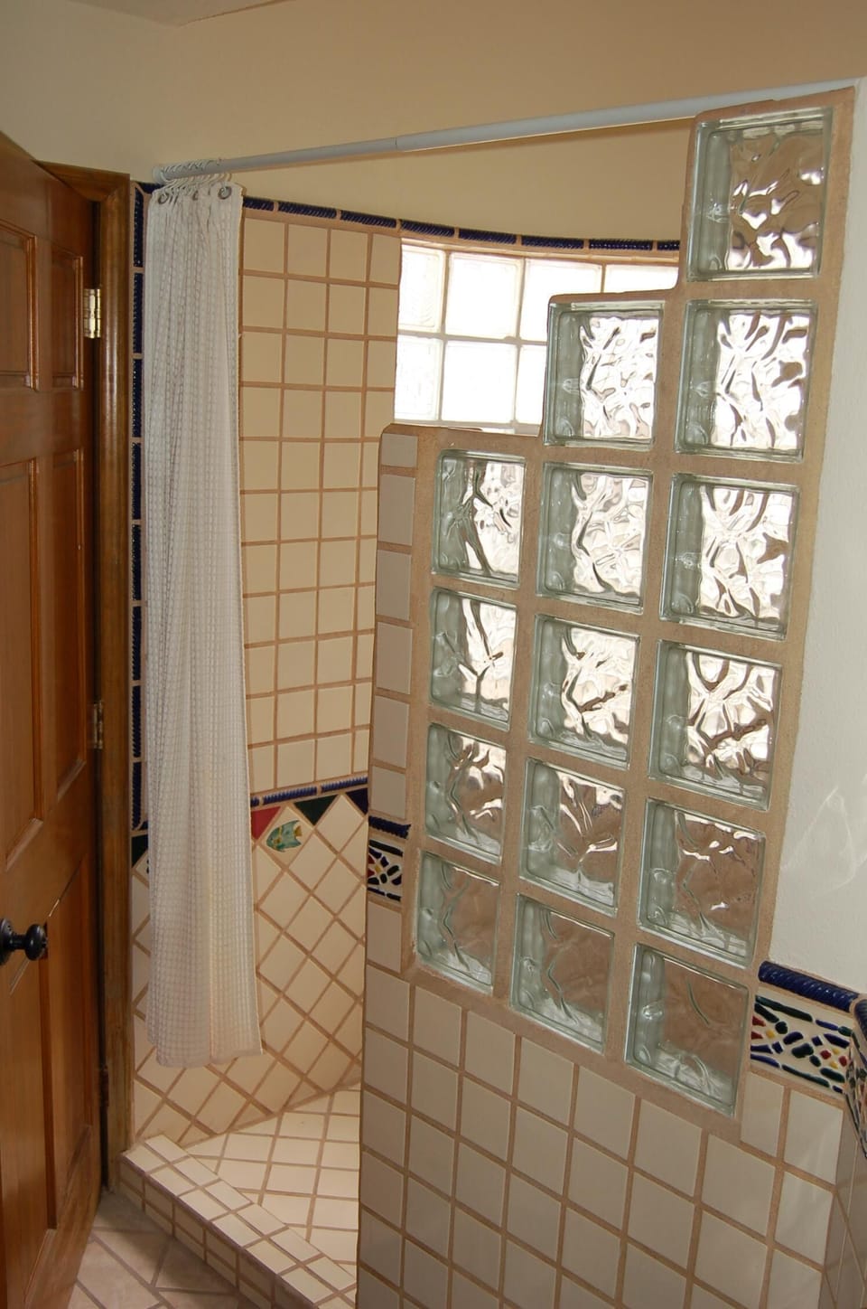 Bath #2 tile work in shower,
Double sink, private toilet.