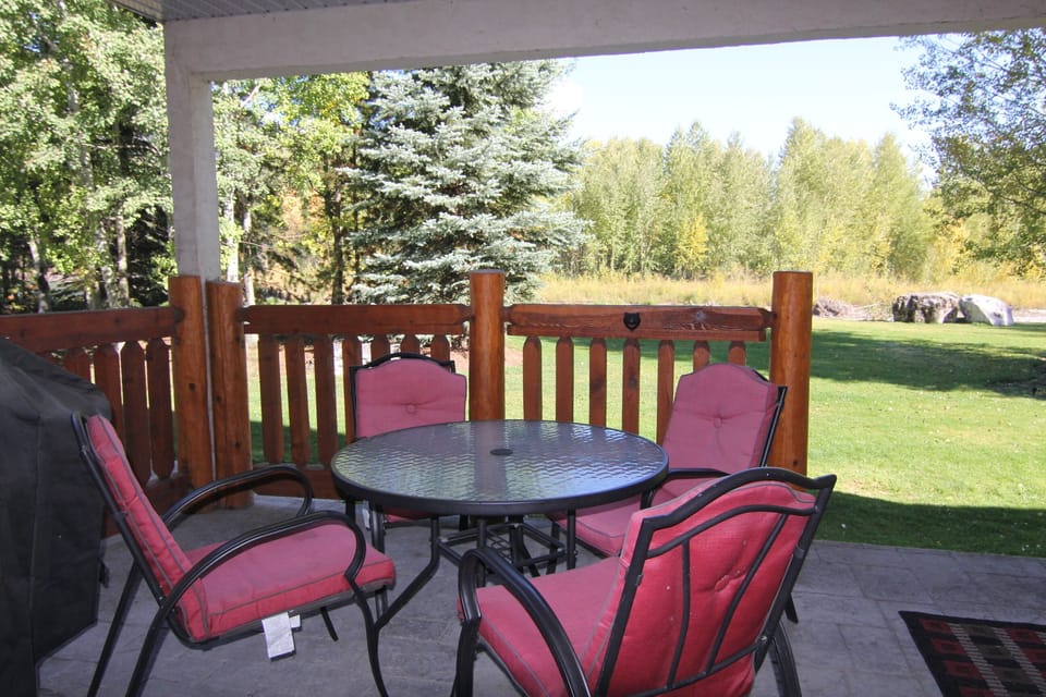 Back patio with beautiful views of the Elk River