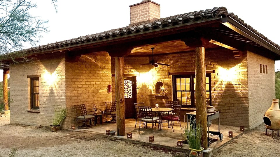 The kiva fireplace adds a  soft glow and crackling voice to create a relaxing at