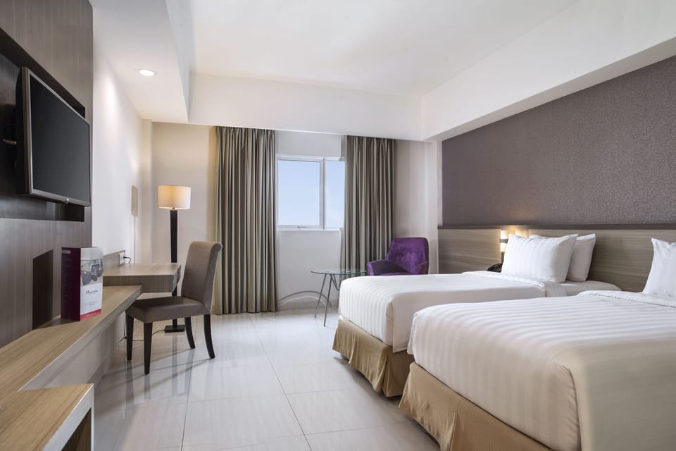 Minibar, desk, soundproofing, rollaway beds