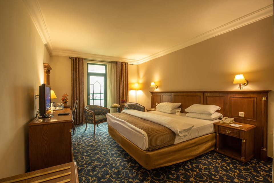 Superior Room | Minibar, in-room safe, desk, soundproofing