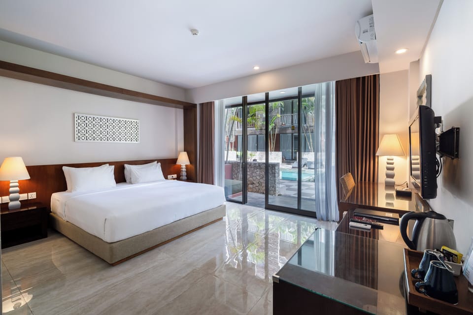 Deluxe Pool Access | In-room safe, desk, blackout drapes, iron/ironing board
