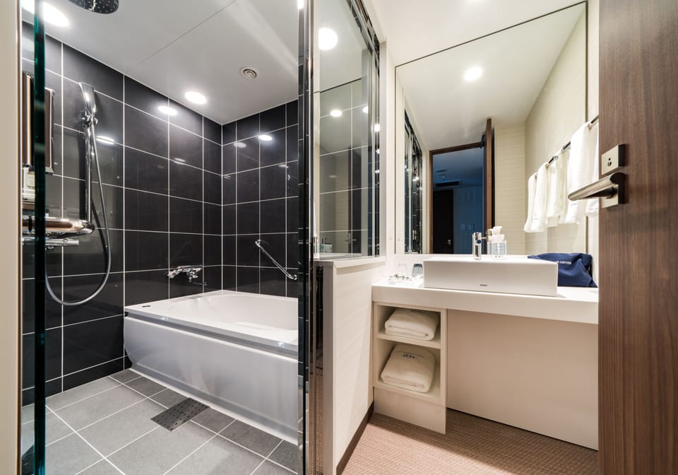 Separate tub and shower, deep soaking tub, free toiletries, hair dryer