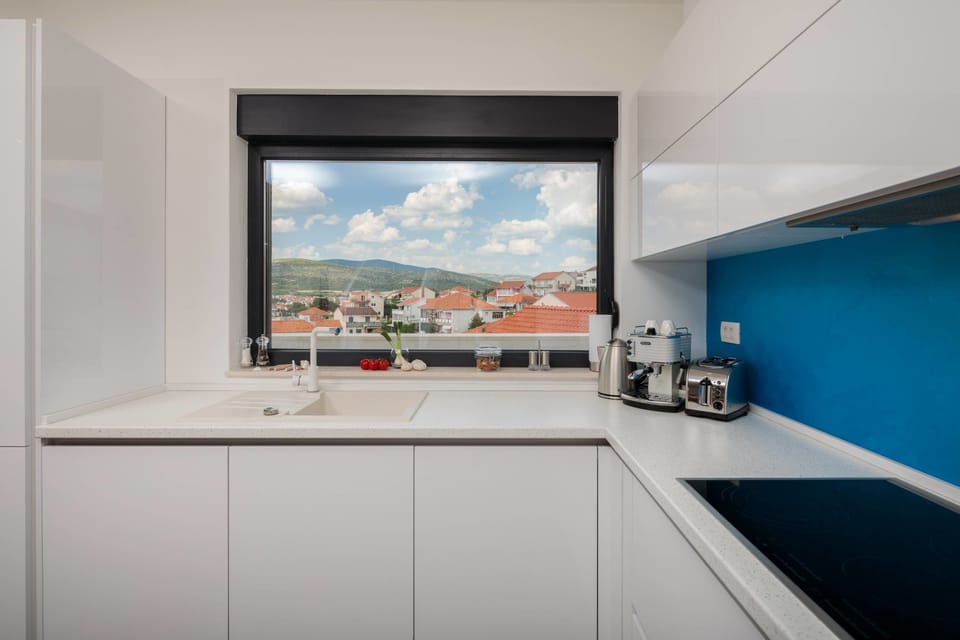 Villa, 4 Bedrooms | Private kitchen | Full-size fridge, microwave, espresso maker, coffee/tea maker