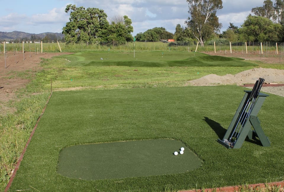 Tee box with view of golf green.