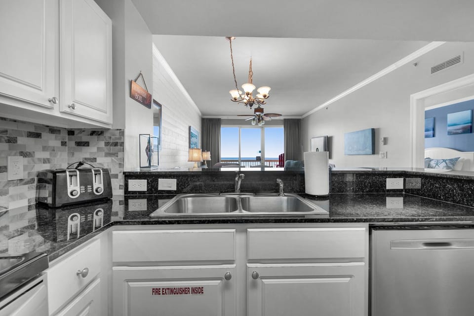 Kitchen - This gourmet kitchen is a chef’s dream, boasting modern appliances, and all the essentials to craft delicious, memorable meals.