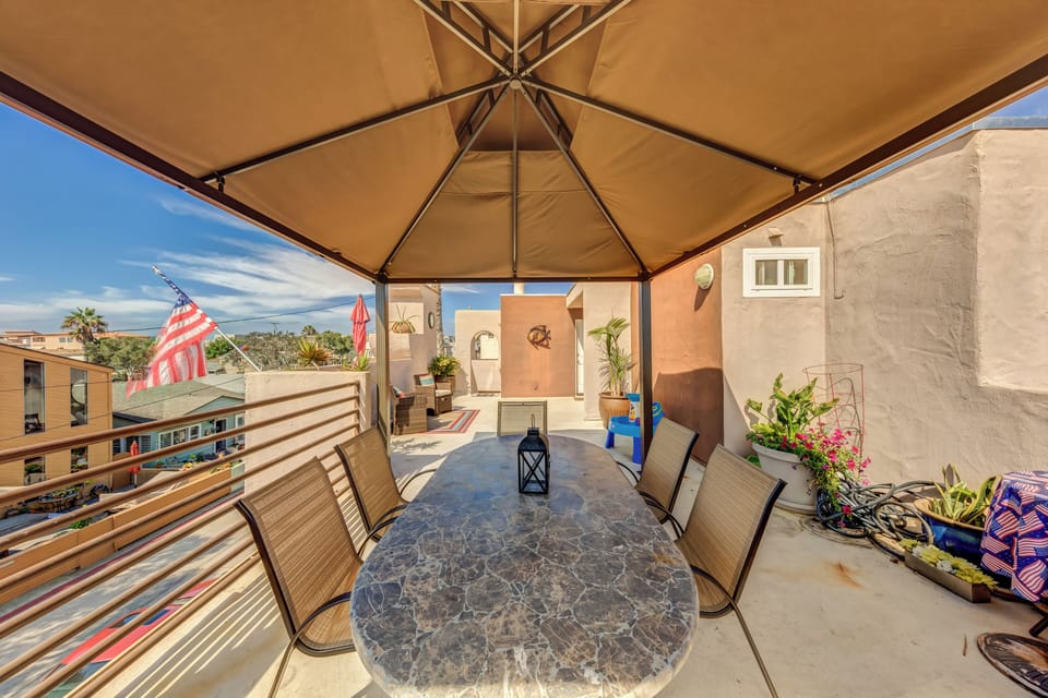 Community dining table on the 3rd floor patio. You have a private patio also