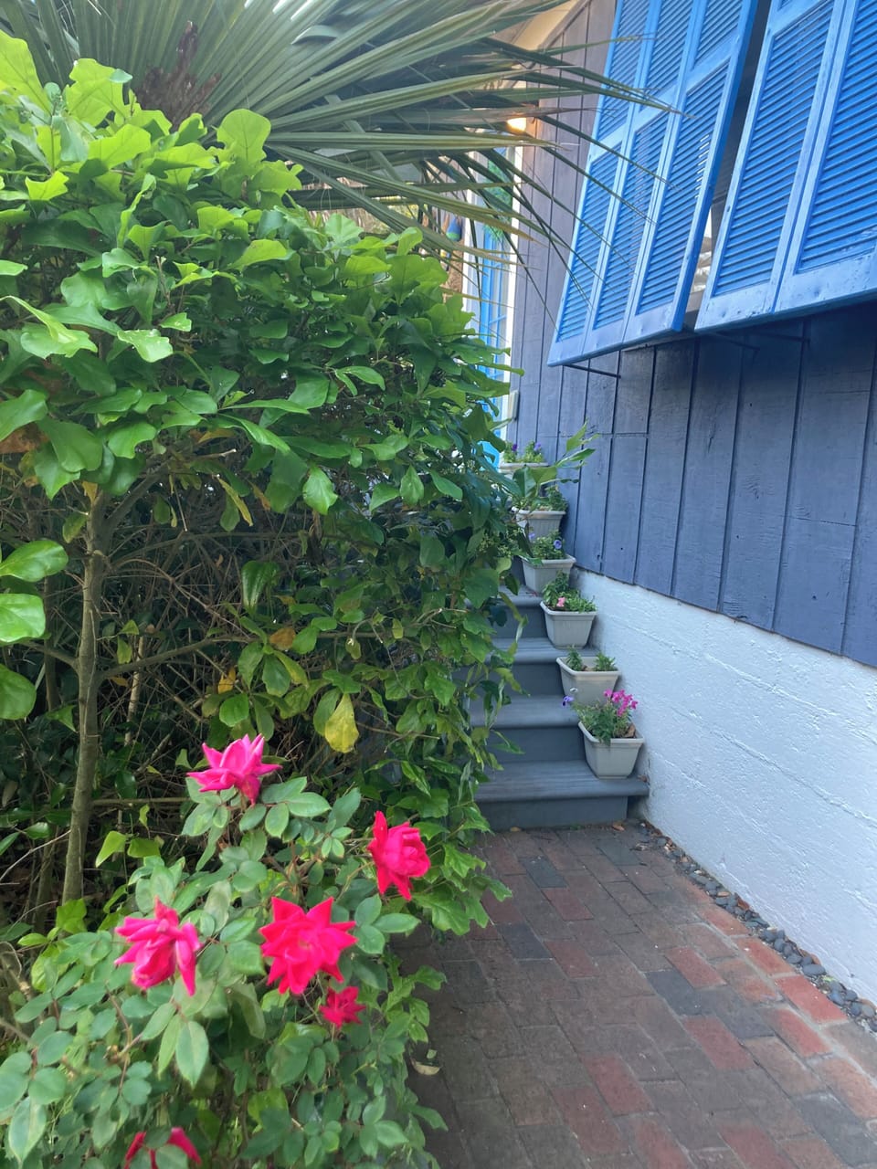 A picturesque & unique vintage home! Six steps lead to front deck & main floor.
