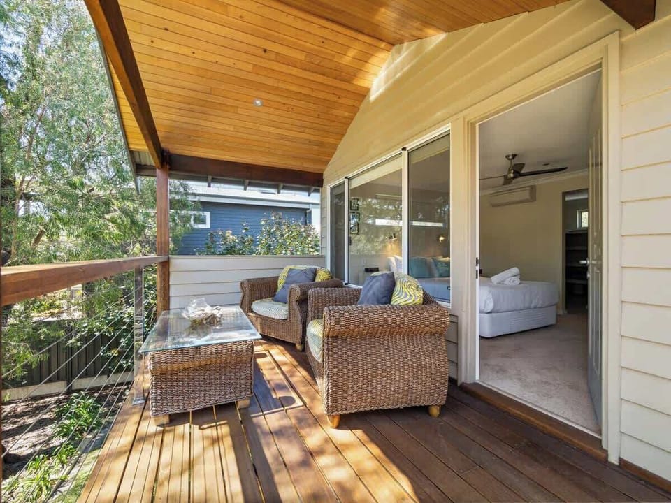 The balcony off the primary bedroom is perfect for morning coffee or quiet afternoon lounging.