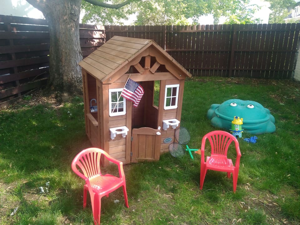 Children's play area. (The sandbox will not be available summer 2026.)