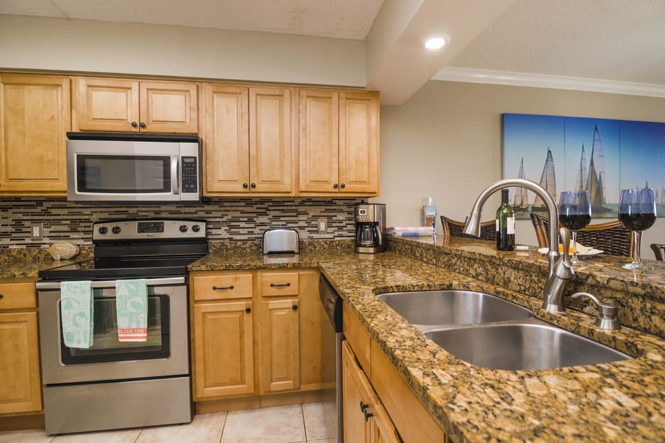 Updated with newer cabinets, granite and backsplash