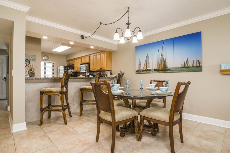 Dining Room with bar stools at wet bar to sit 7 comfortably