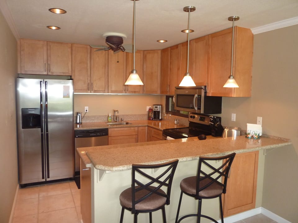 Kitchen, granite countertops and well outfitted