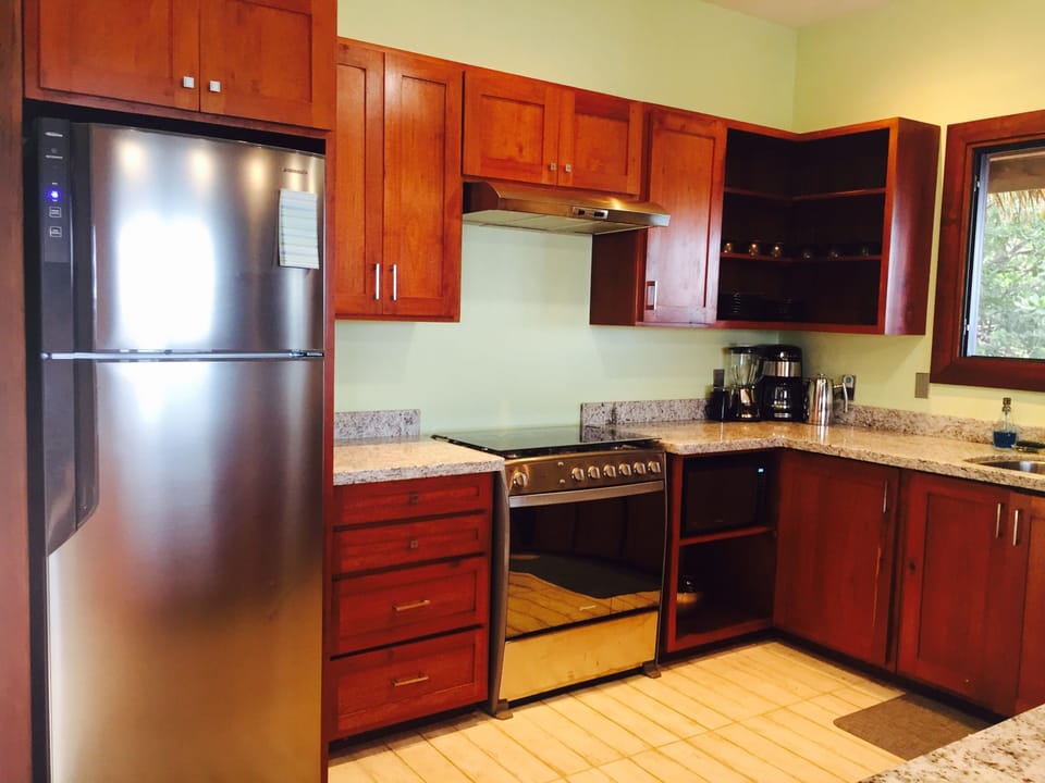 Well equipped modern kitchen with full size appliances