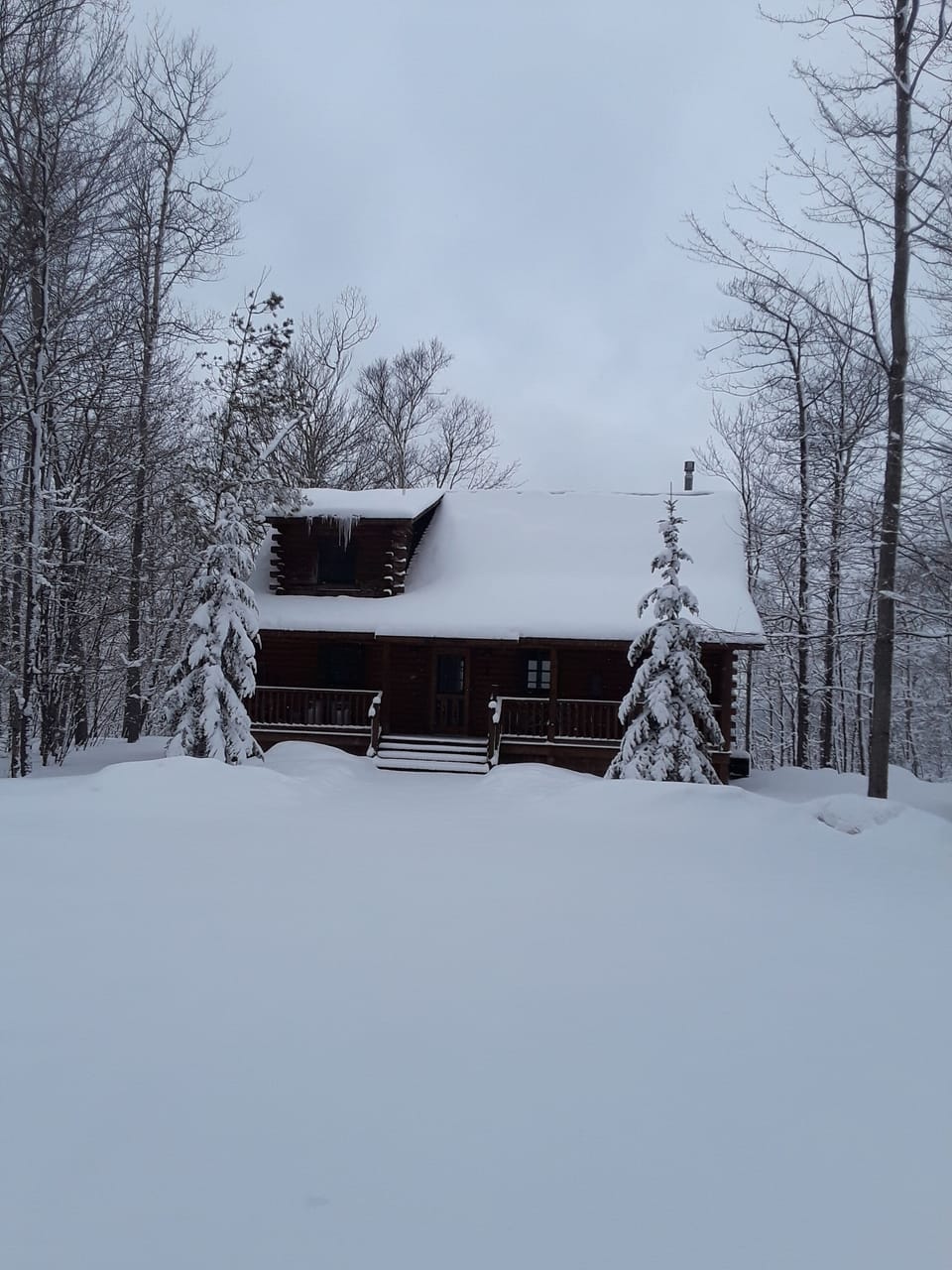 Relax with the gas fireplace, hot tub, and the changing views of Lake Huron