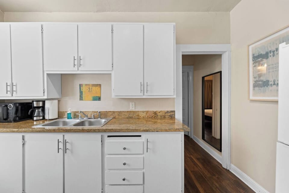 Enjoy effortless cooking with ample counter space and plenty of shelving for storage.