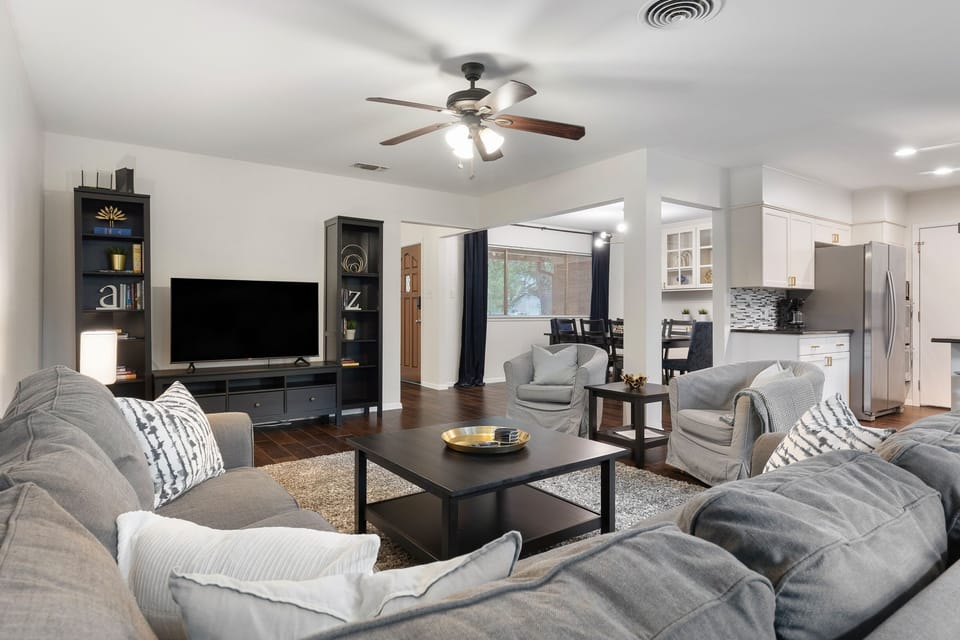 Flat-screen TV, DVD player, books, video library