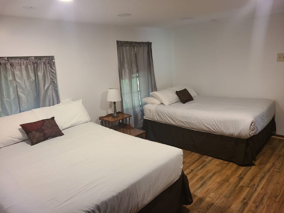 Two Full Beds First Floor with Entrance to Full Bathroom.