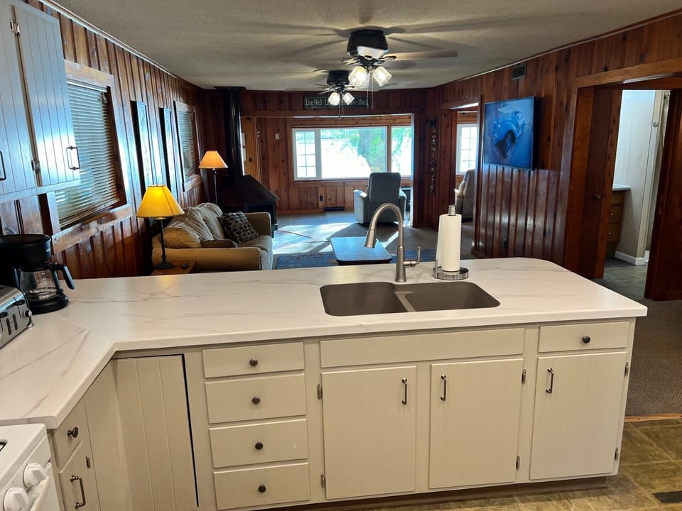 Kitchen with bar eating area.