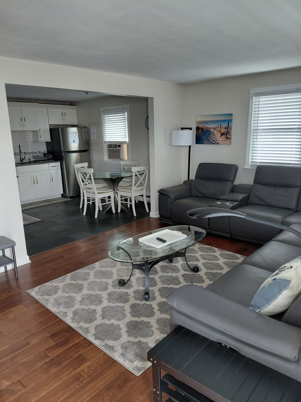 View of living room/kitchen from front door