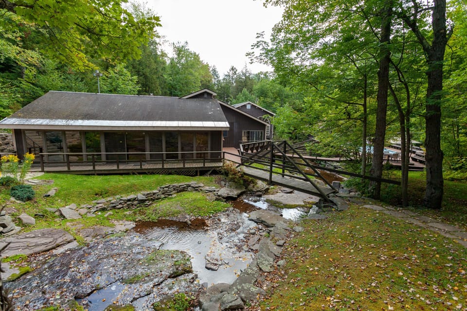 Section of house with large open concept kitchen, dining, living, billiard area